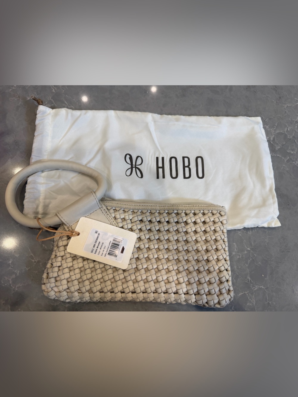 HOBO Cream Woven Leather Clutch with Floral Lining